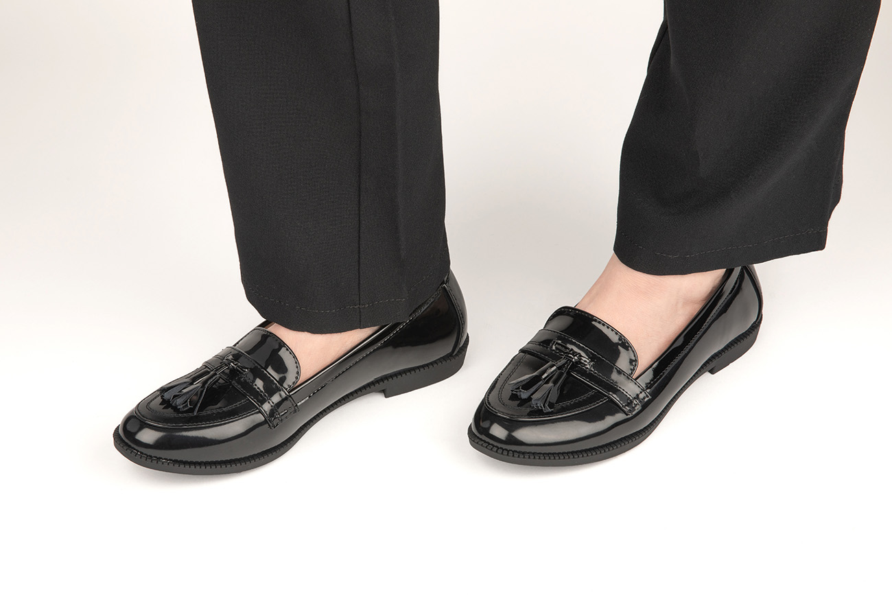 black loafers with tassels